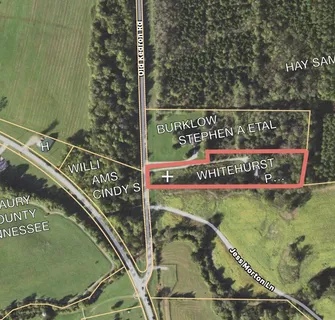 a view of a swimming pool with a wooden deck