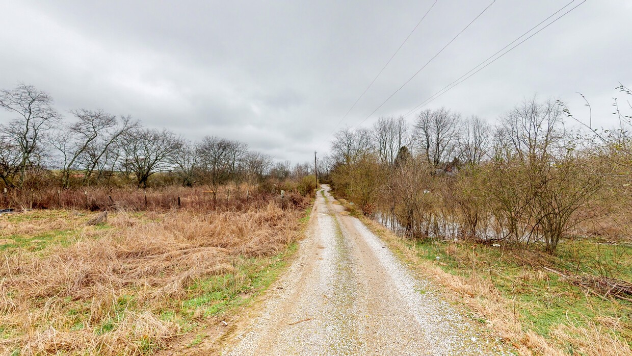 1009 Old Kedron Road Spring Hill, TN 37174 - Photo 6 of 13 a view of a yard with wooden fence