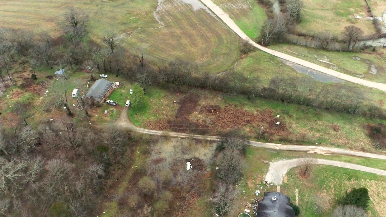 1009 Old Kedron Road Spring Hill, TN 37174 - Photo 9 of 13 a view of a lake from a yard