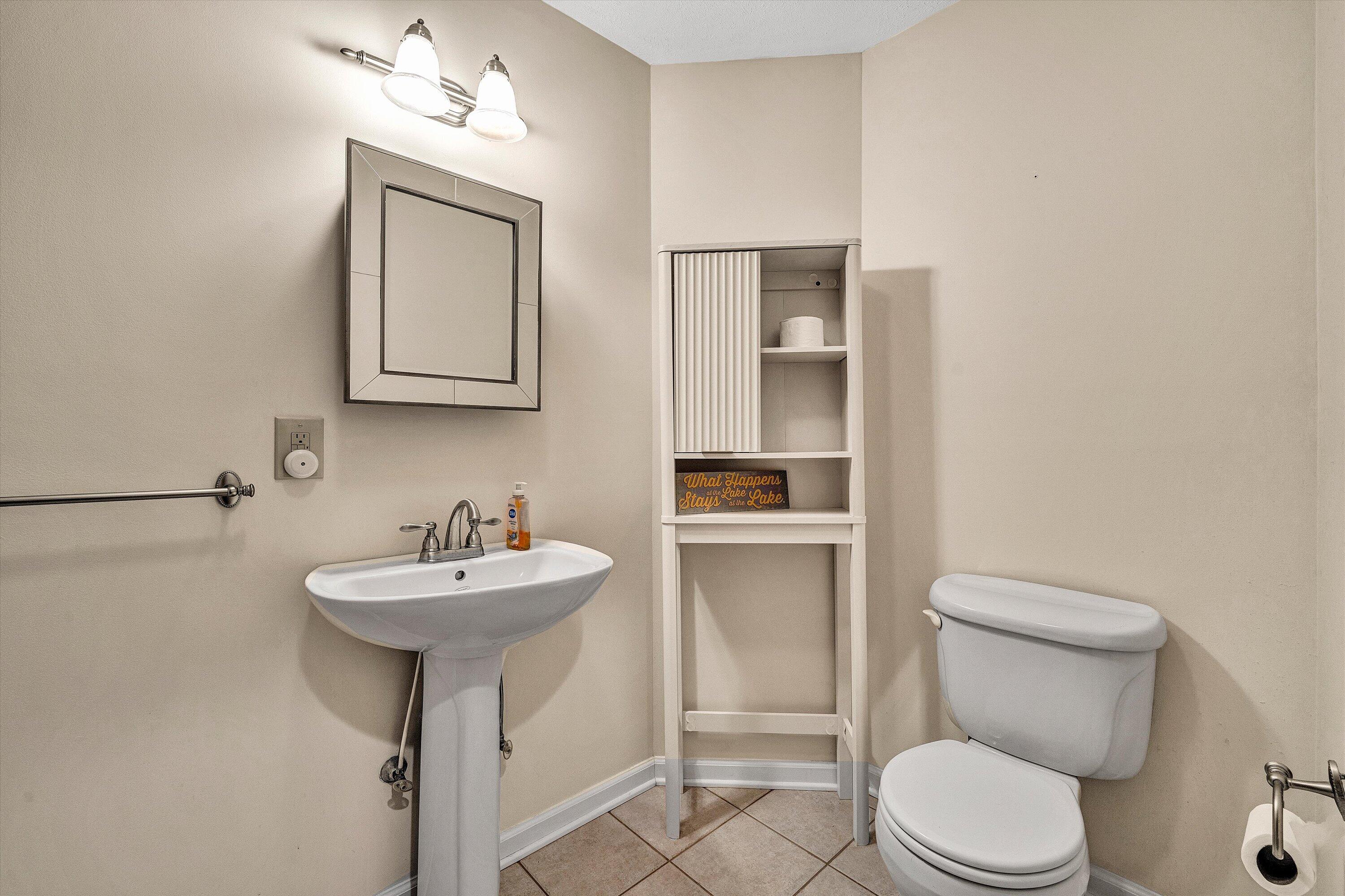 400 Harbor Moneta, VA 24121 - Photo 13 of 51 a bathroom with a toilet sink and mirror
