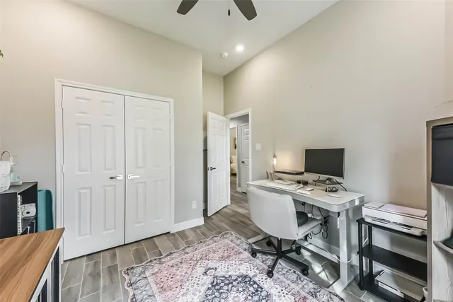 a workspace with furniture and wooden floor
