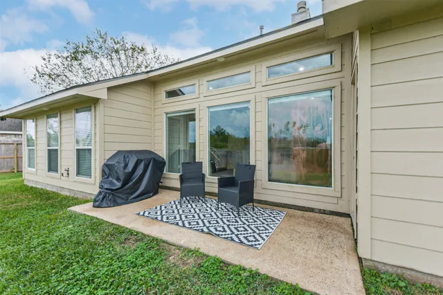 a view of a porch with furniture
