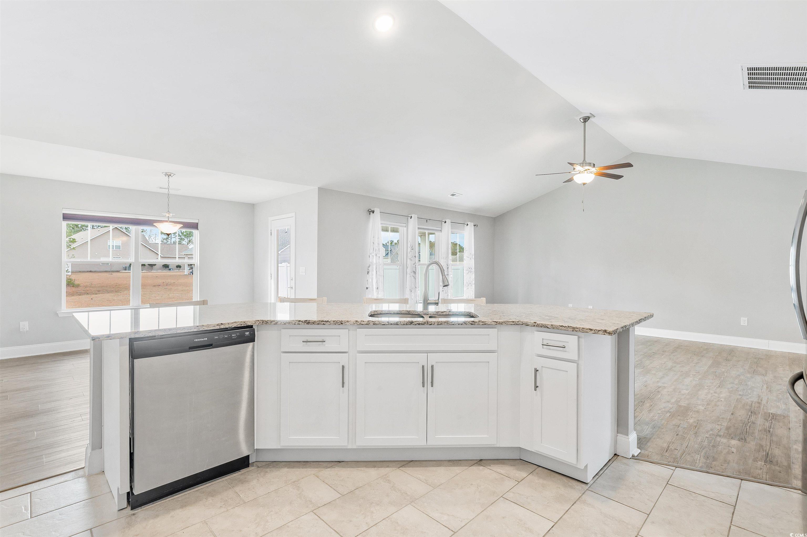 317 Marsh Tacky Loop Myrtle Beach, SC 29588 - Photo 8 of 29 Kitchen featuring hanging light fixtures, ceiling