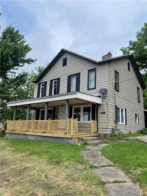 223 East Falls Street, Unit 1B New Castle, PA 16101 - Photo 1 of 14 a front view of a house with a yard