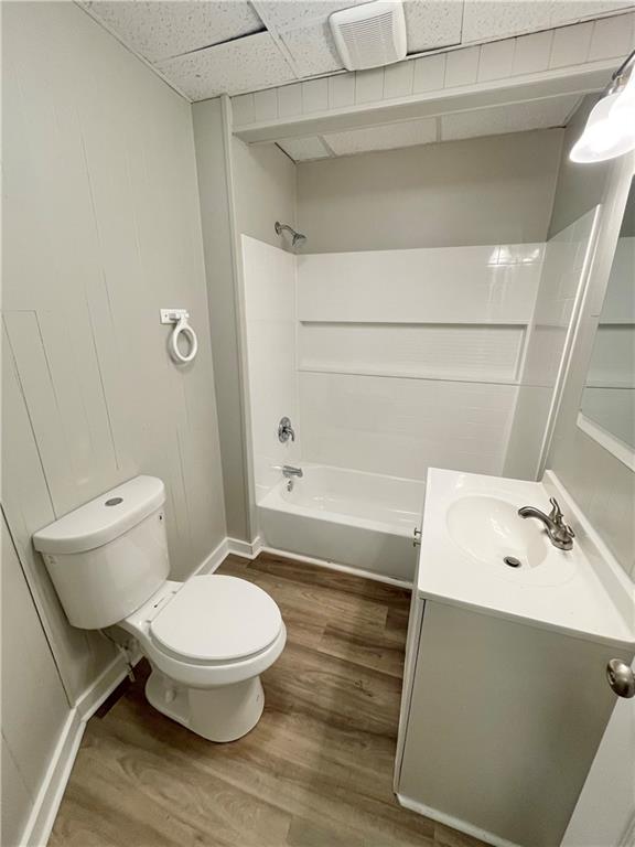 223 East Falls Street, Unit 1B New Castle, PA 16101 - Photo 11 of 14 a bathroom with a sink a toilet and shower