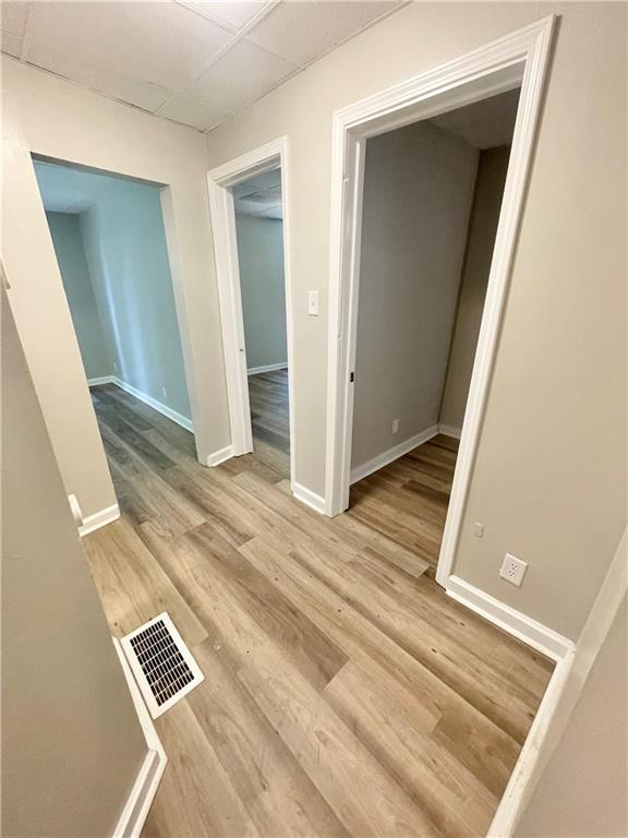 223 East Falls Street, Unit 1B New Castle, PA 16101 - Photo 7 of 14 an empty room with wooden floor