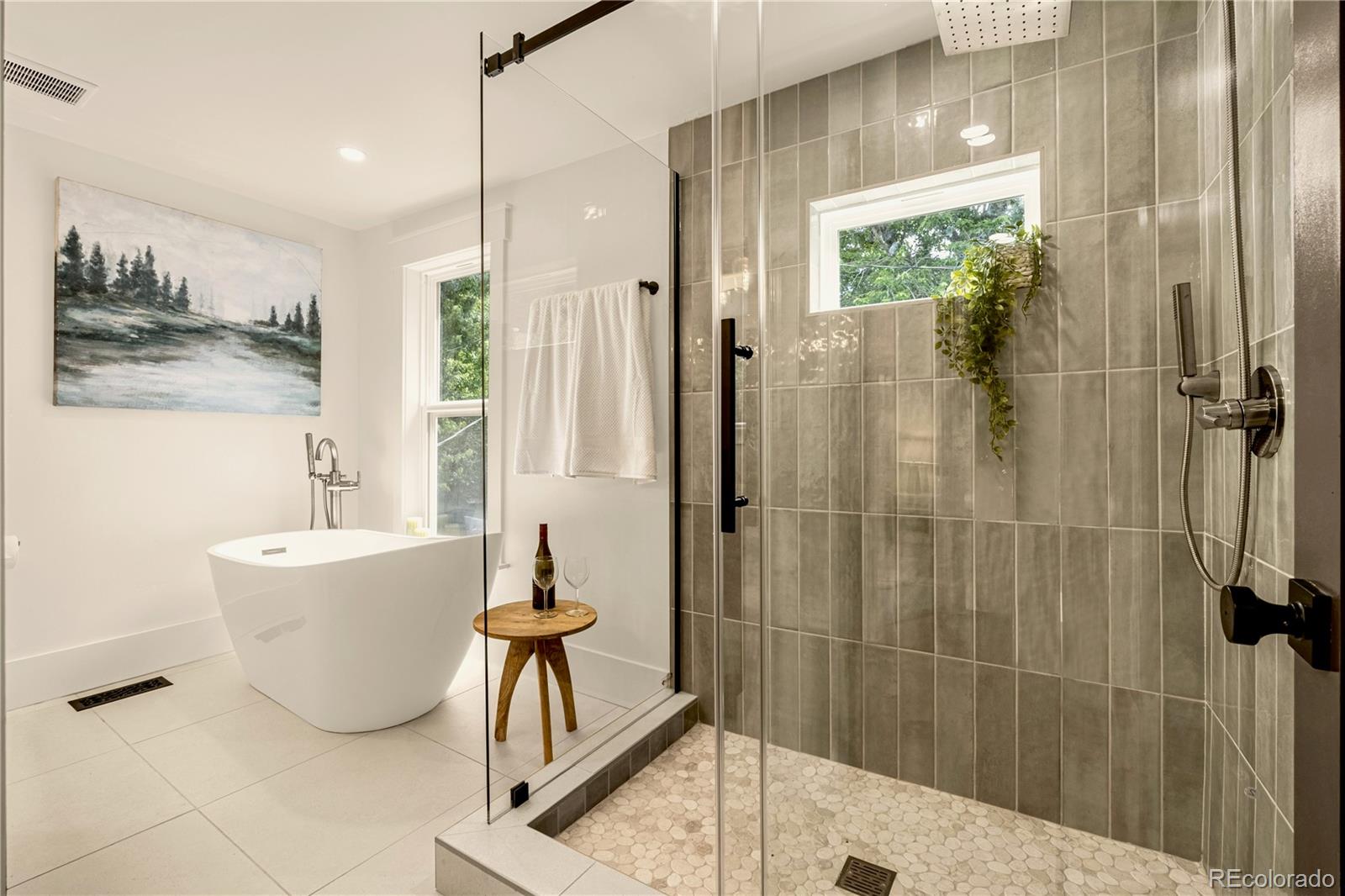 200 West Cheyenne Road Colorado Springs, CO 80906 - Photo 15 of 24 a bathroom with a bathtub and shower