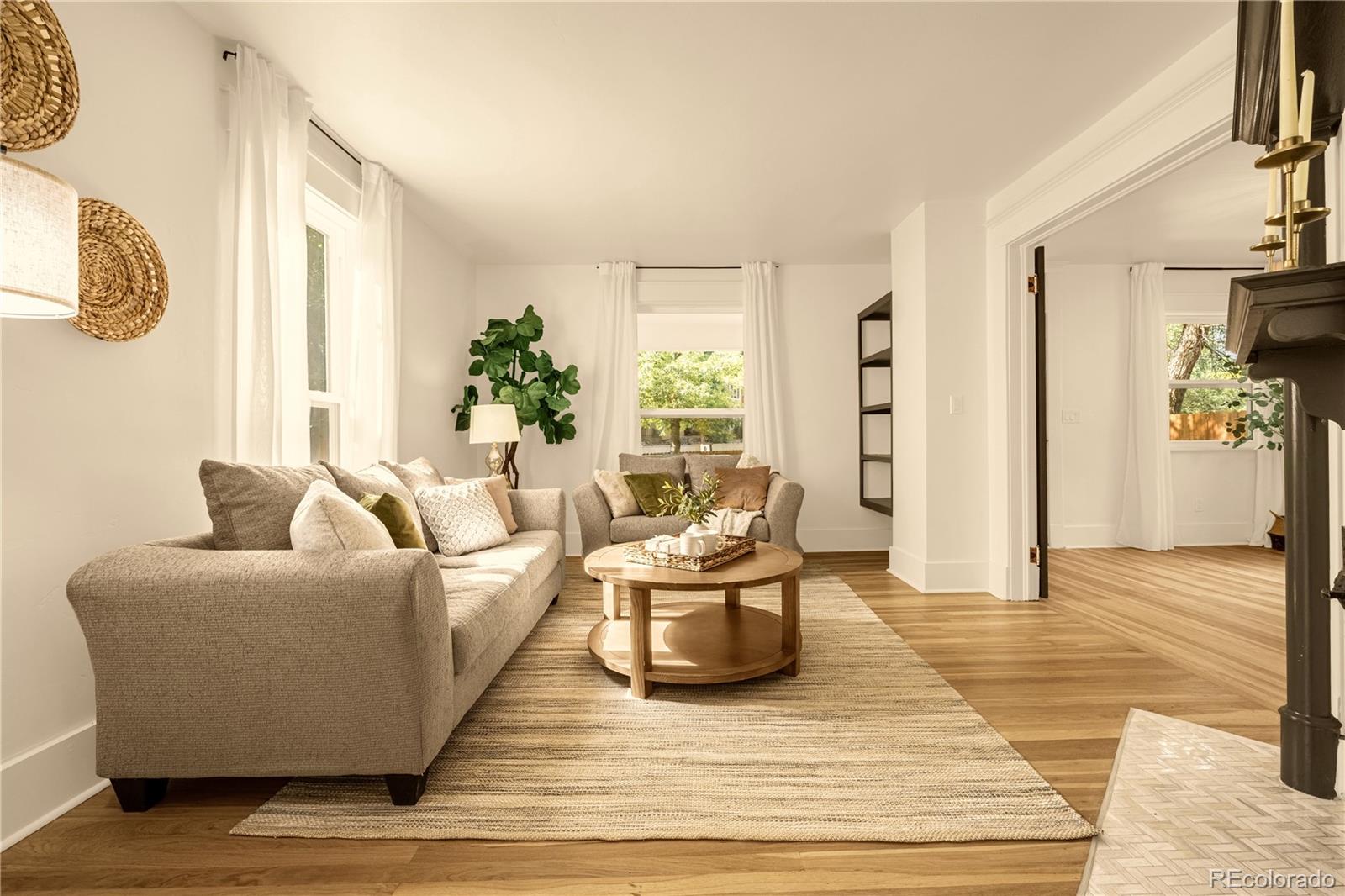 200 West Cheyenne Road Colorado Springs, CO 80906 - Photo 7 of 24 a living room with furniture and a large window