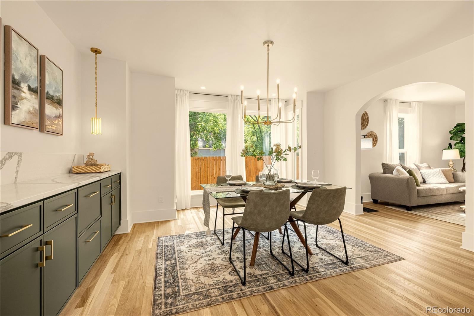 200 West Cheyenne Road Colorado Springs, CO 80906 - Photo 9 of 24 a view of a dining room with furniture window and wooden floor