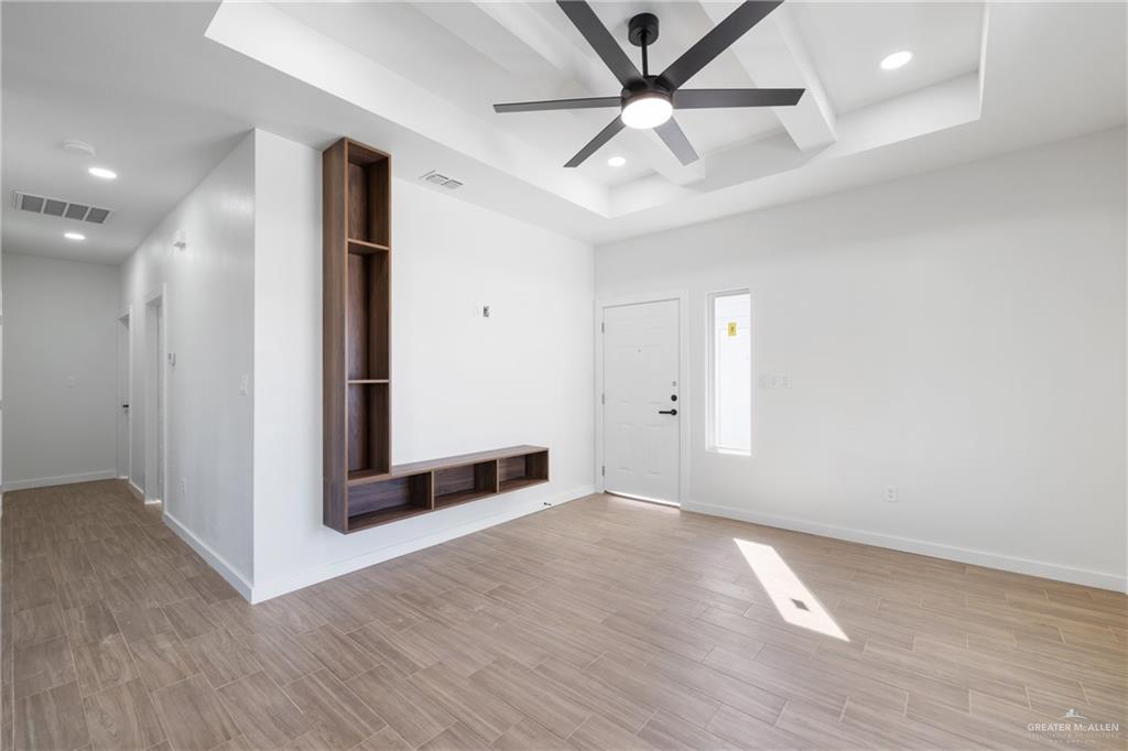 2900 Gabriel Street, Unit 4 Mission, TX 78574 - Photo 4 of 14 an empty room with fan and windows