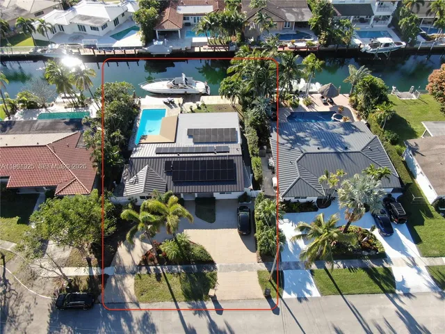 a view of a park with palm trees