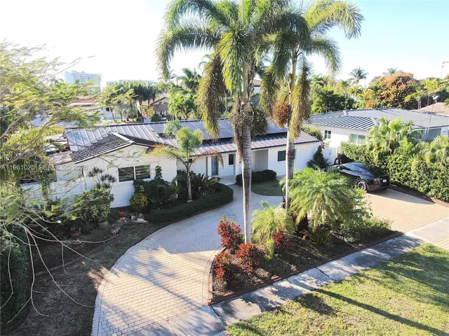 a view of a garden with potted plants