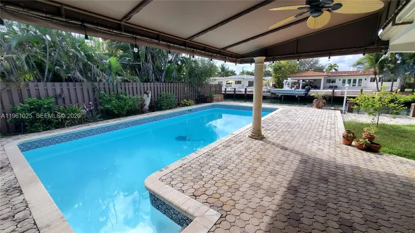 a view of yard with patio