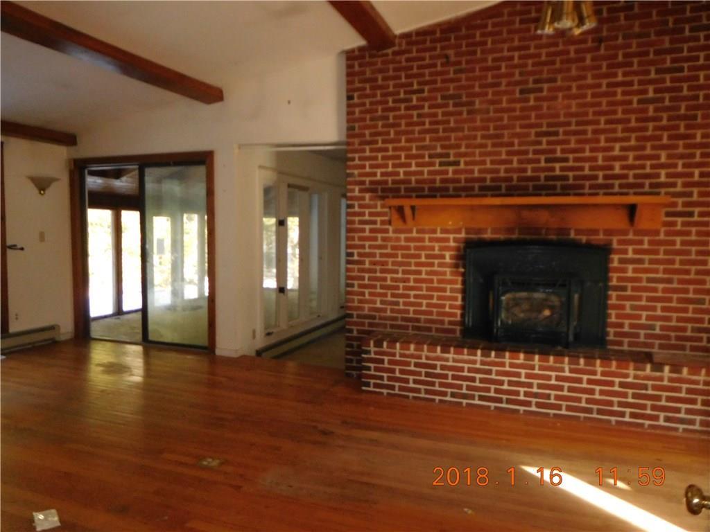 38 Middle Road Cumberland Center, ME 04021 - Photo 5 of 17 Large dining area with fireplace