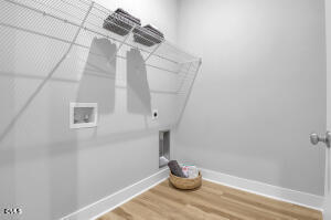 1111 Masters Place Way Durham, NC 27703 - Photo 16 of 37 a view of small space with wooden floor and a window