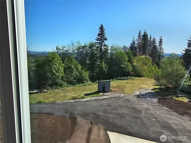 a view of a yard with a slide