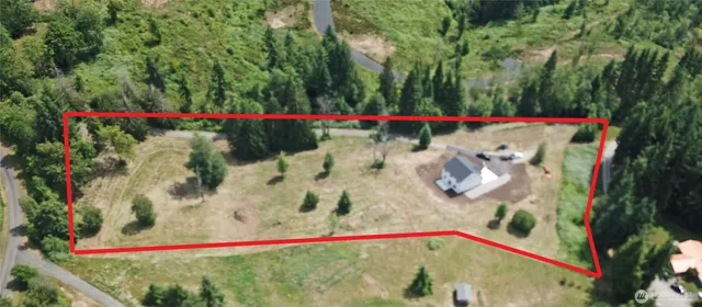 a view of swimming pool and red umbrella