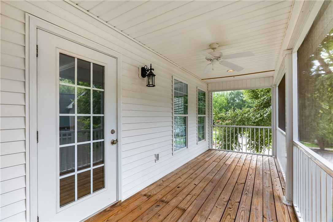 206 Village Way Pendleton, SC 29670 - Photo 30 of 46 Step out onto this spacious screened porch, offering serene views and comfortable outdoor living.
