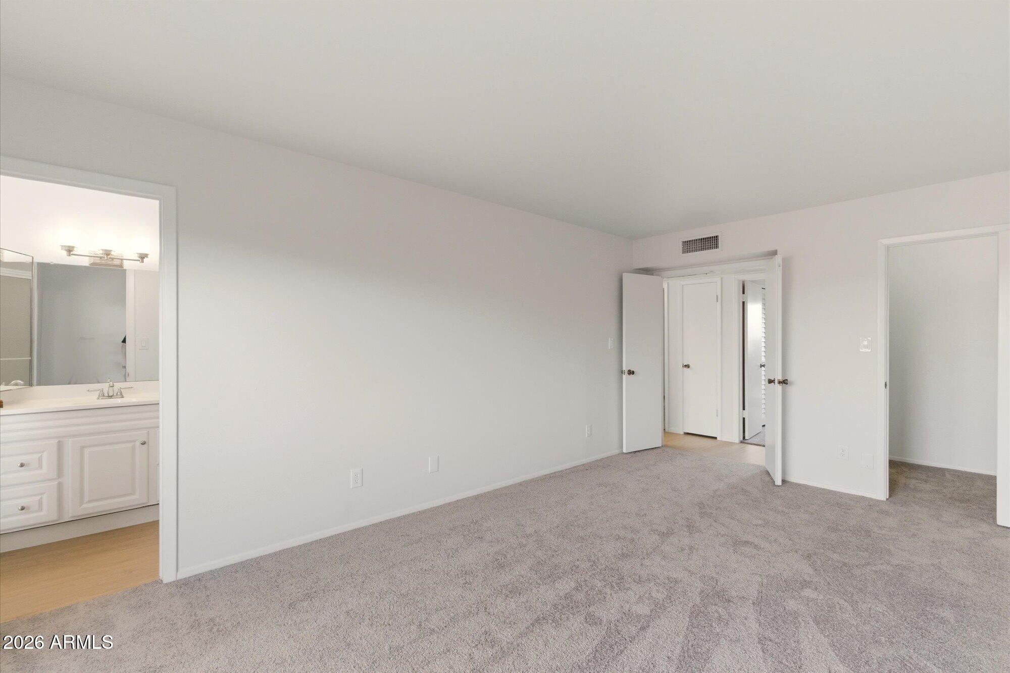 4016 West Griswold Road Phoenix, AZ 85051 - Photo 13 of 26 Primary Bedroom