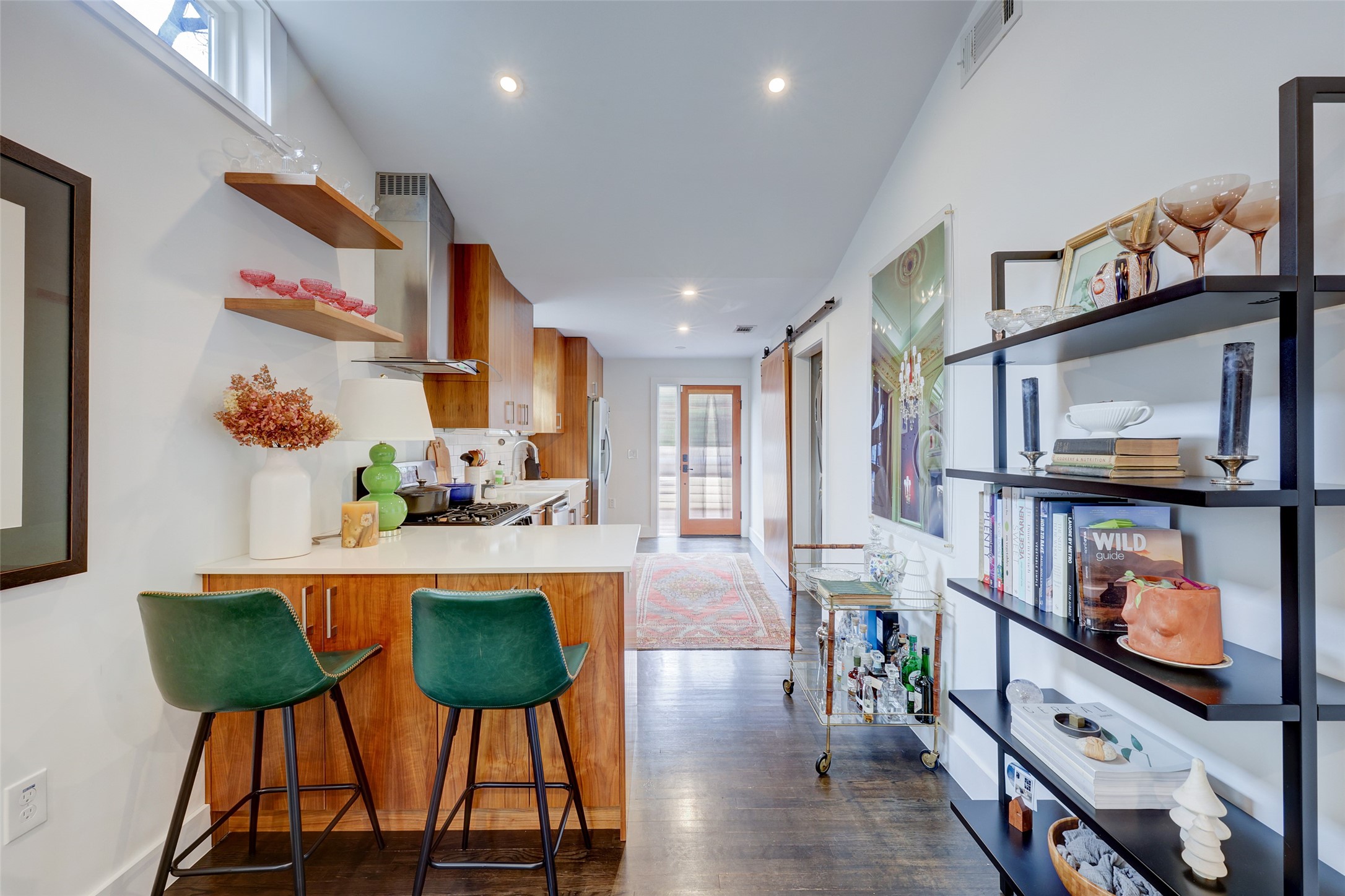 2306 Santa Maria Street Austin, TX 78702 - Photo 2 of 17 a living room with furniture and a flat screen tv