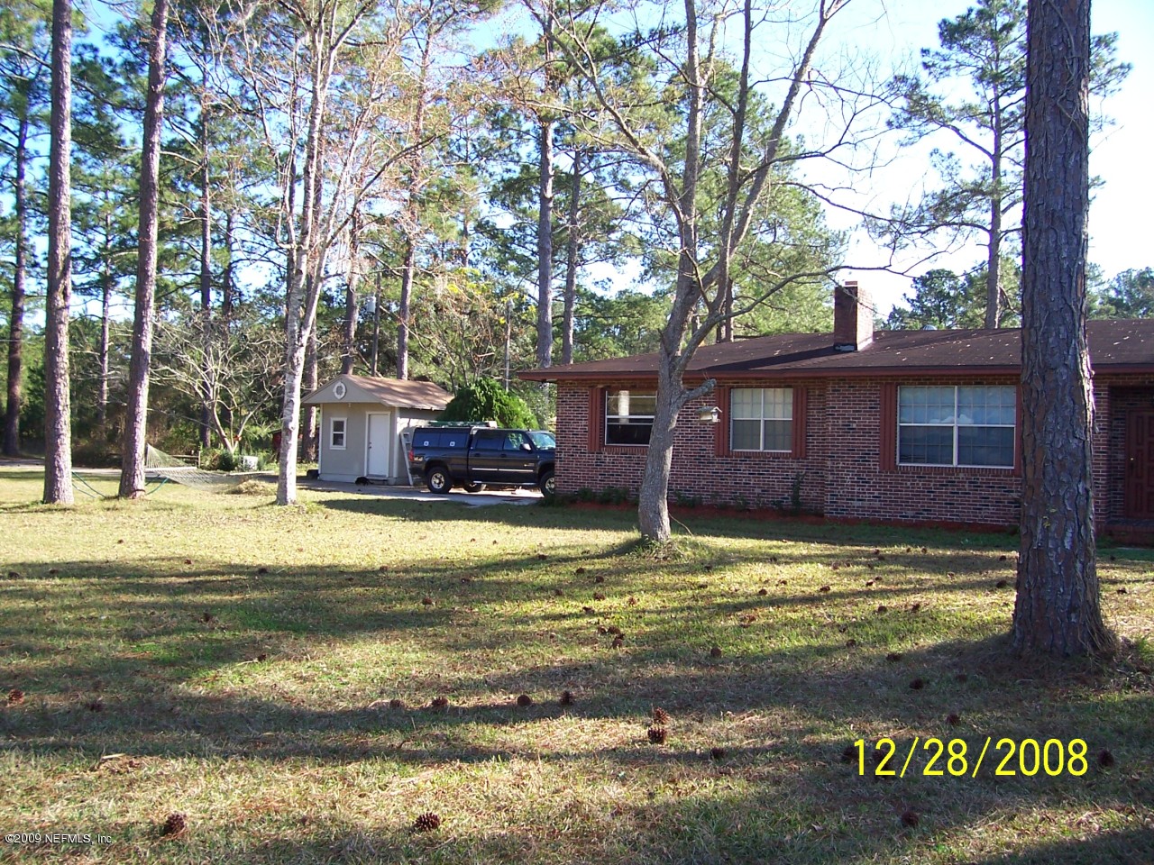 44170 Commanchee Road Callahan, FL 32011 - Photo 1 of 5 a view of a house with swimming pool