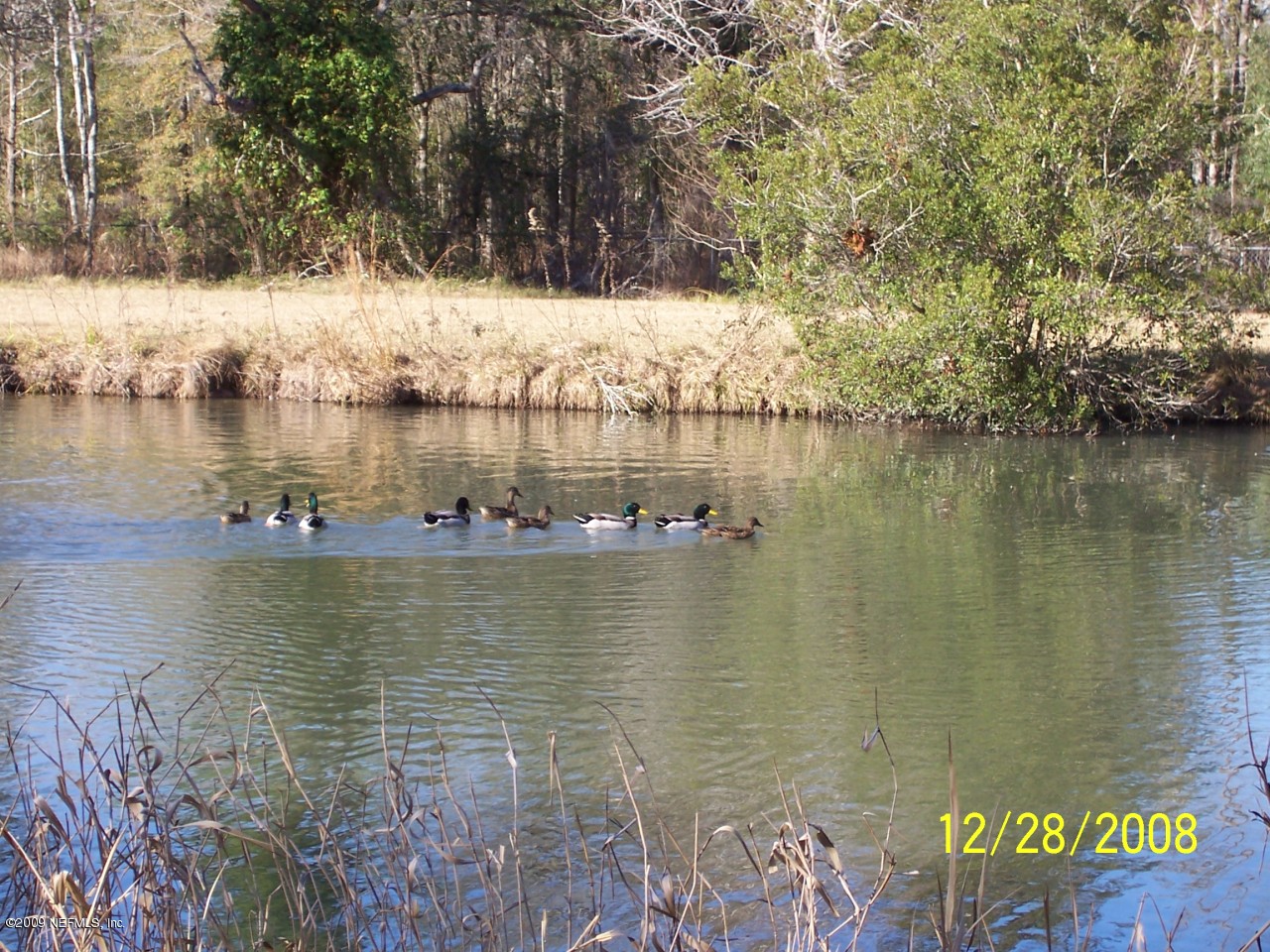 44170 Commanchee Road Callahan, FL 32011 - Photo 2 of 5 a view of a lake view