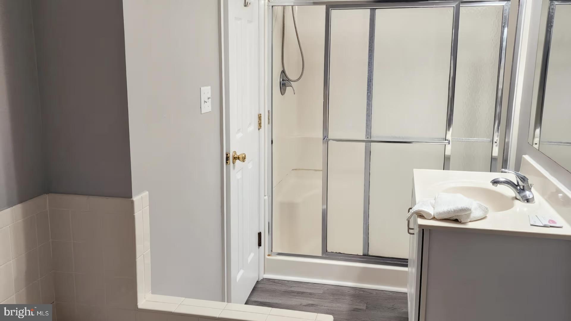 105 Edward Taylor Road, Unit 273 39 Ocean City, MD 21842 - Photo 21 of 23 a bathroom with a sink and a mirror