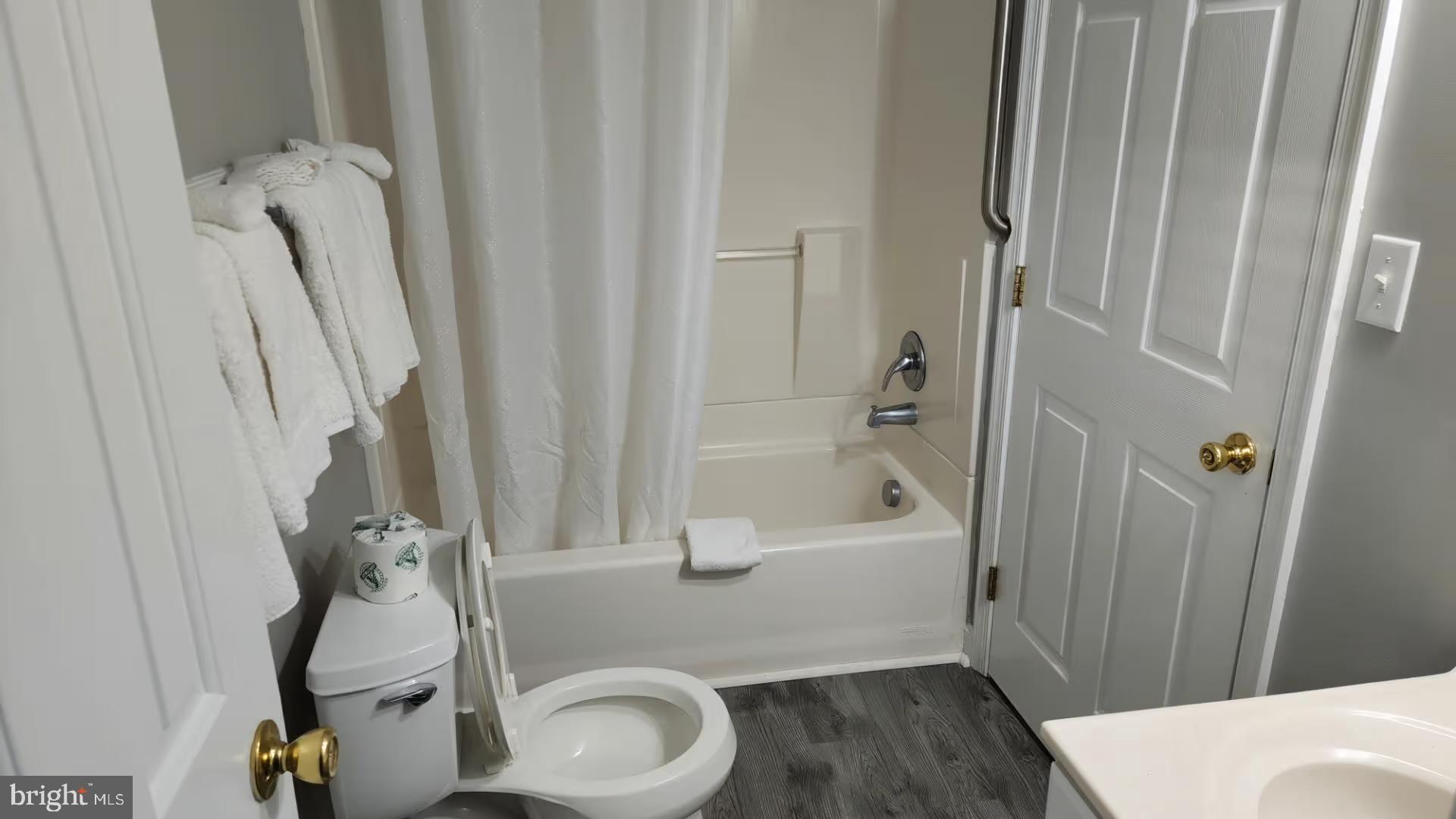 105 Edward Taylor Road, Unit 273 39 Ocean City, MD 21842 - Photo 22 of 23 a bathroom with a sink a toilet and shower