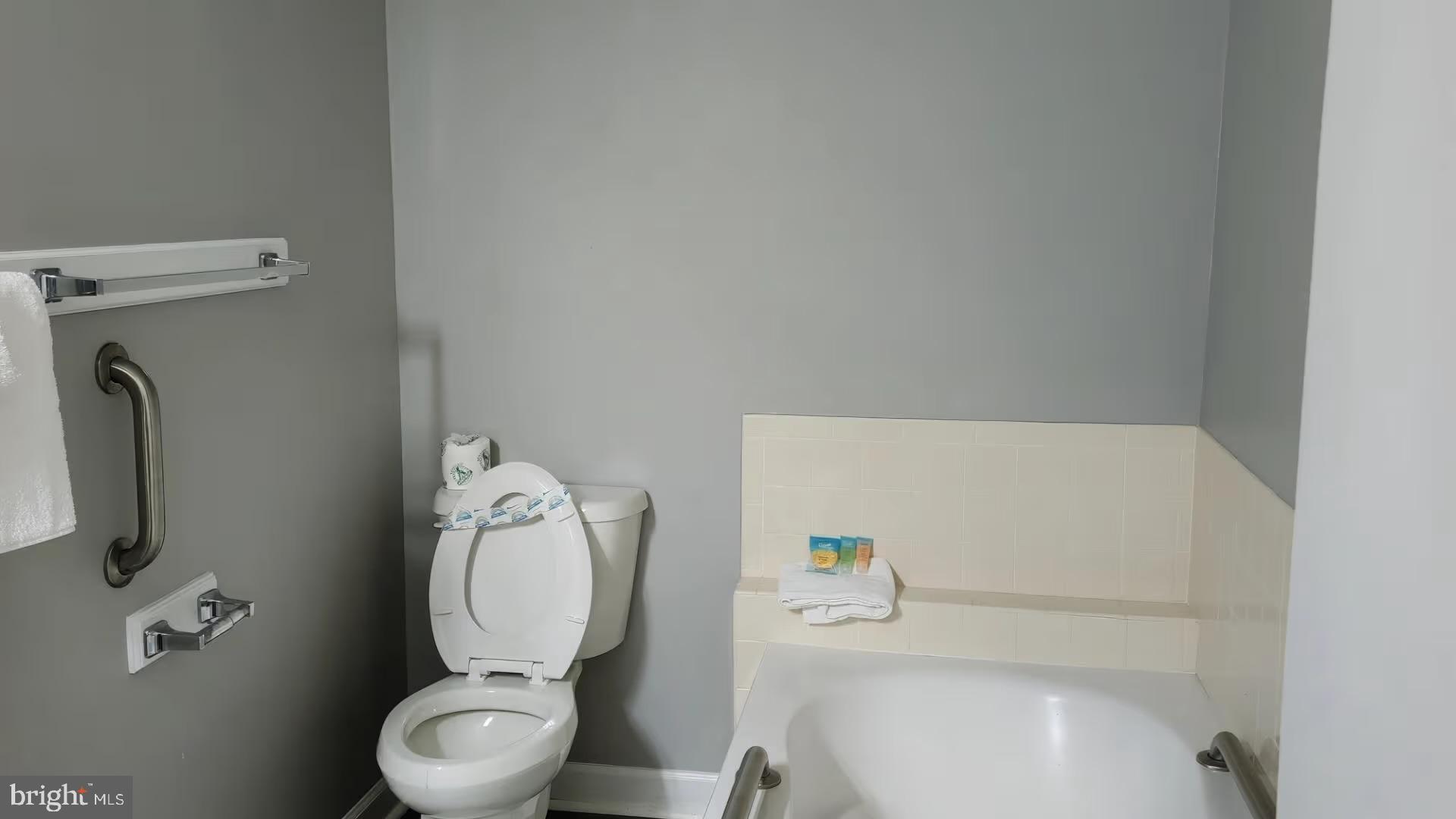 105 Edward Taylor Road, Unit 273 39 Ocean City, MD 21842 - Photo 23 of 23 a white toilet sitting next to a white sink