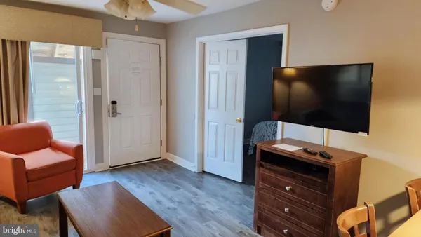 a kitchen with a sink and a refrigerator