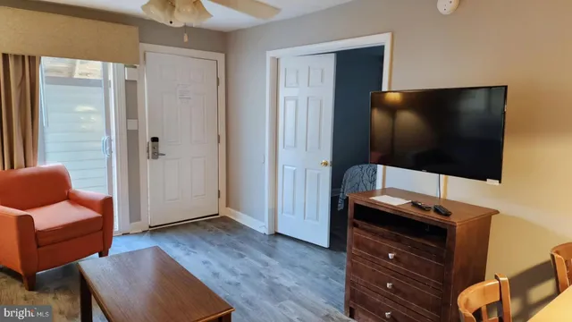 a kitchen with a sink and a refrigerator