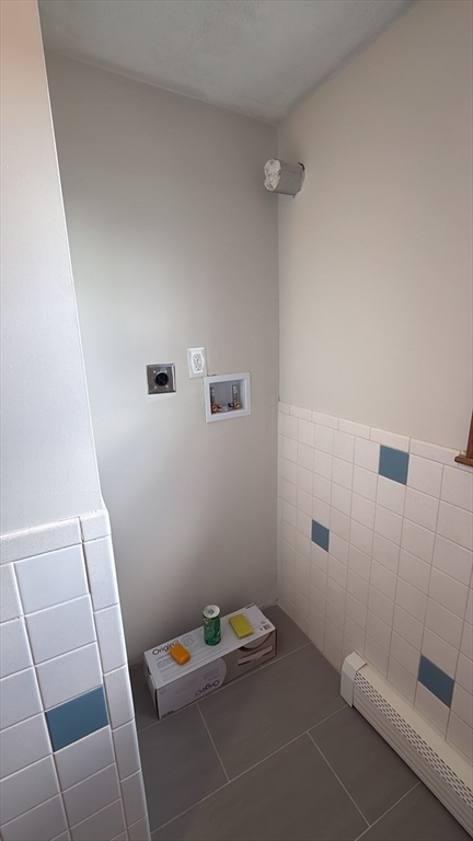 83 Pemberton Street, Unit A Revere, MA 02151 - Photo 13 of 13 a bathroom with a sink and shower