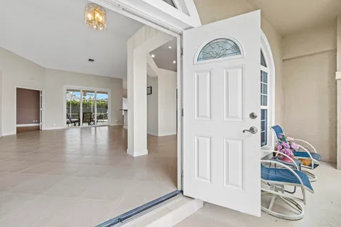 a view of an entryway with a chandelier