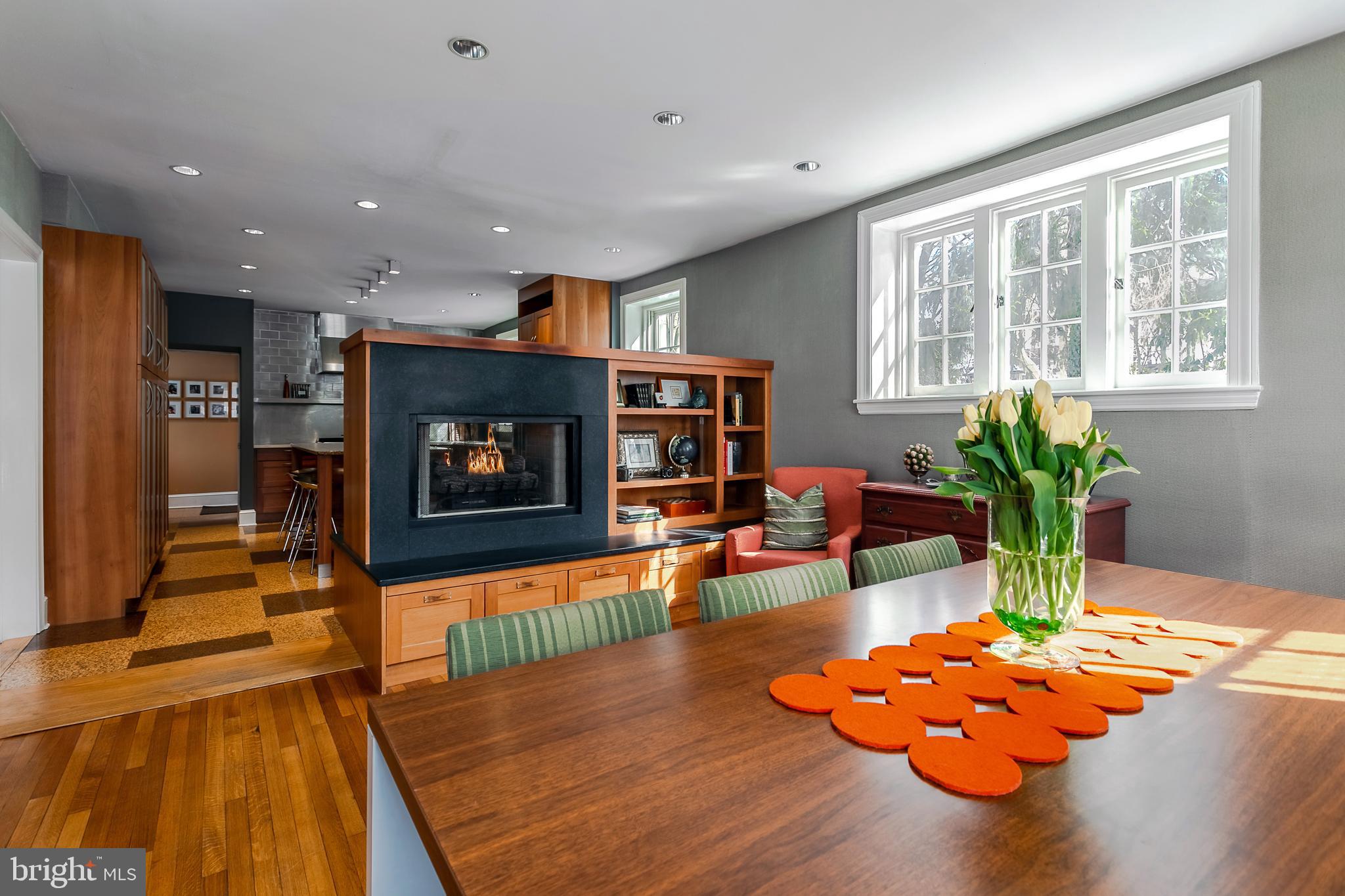 401 Baird Road Merion Station, PA 19066 - Photo 15 of 59 Dining, double sided gas fireplace and built ins