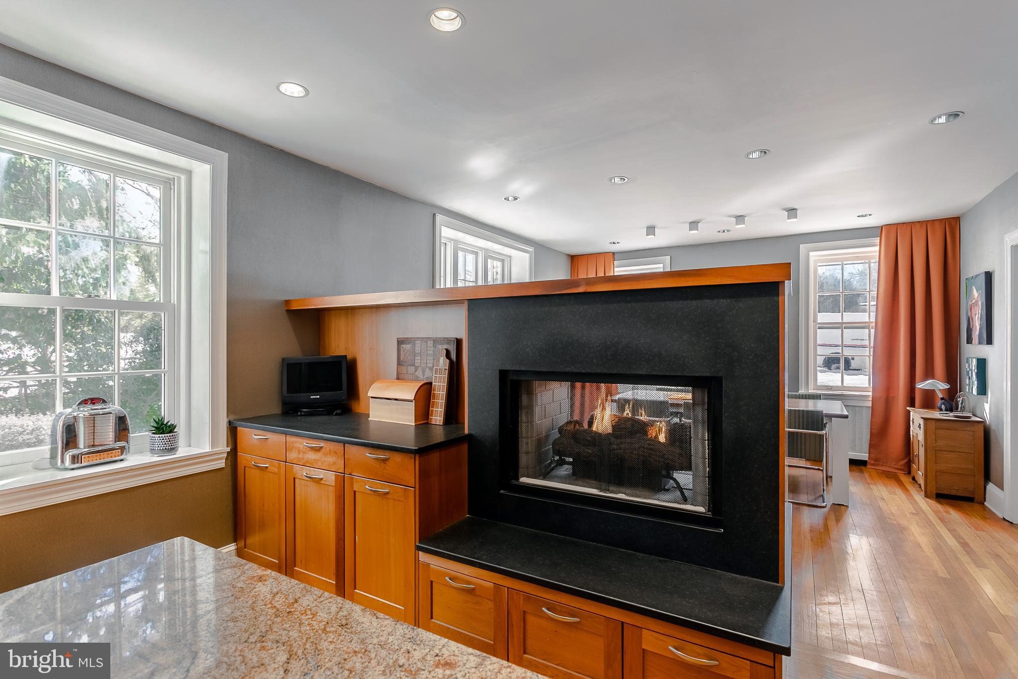 401 Baird Road Merion Station, PA 19066 - Photo 18 of 59 Double sided gas fireplace