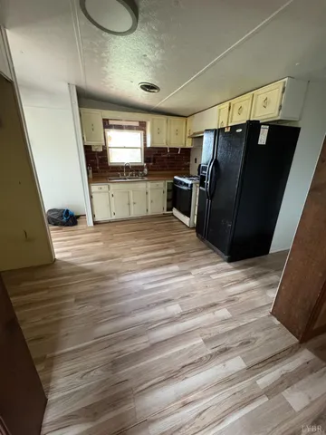a view of a kitchen with a sink