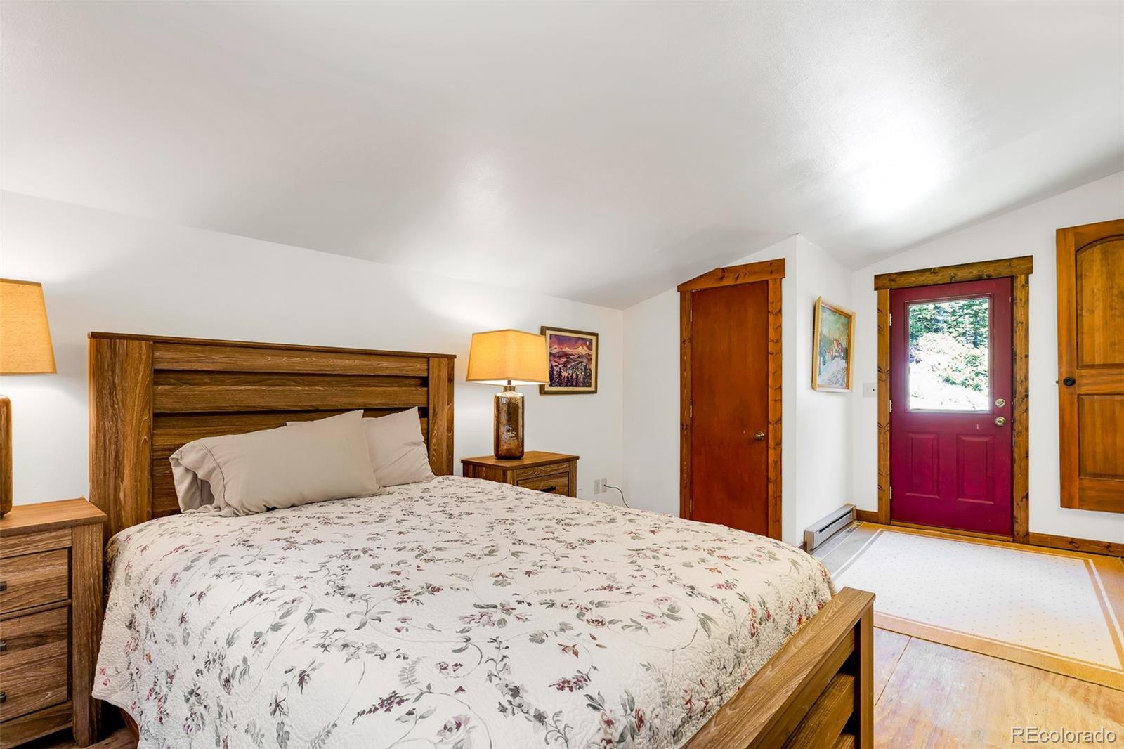 60 Jackson Alma, CO 80420 - Photo 36 of 49 a bedroom with a large bed and a dresser