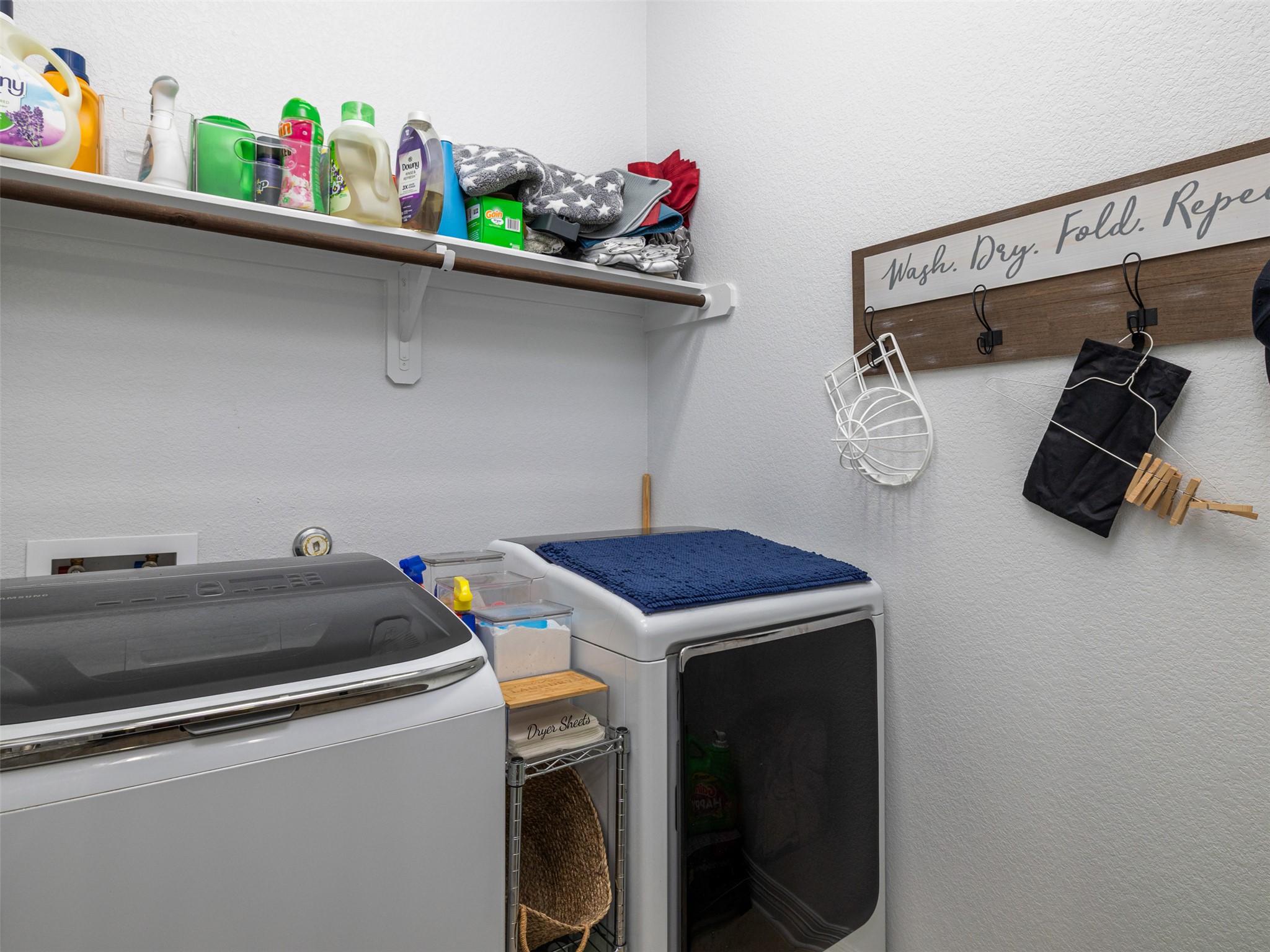 717 Blue Agave Lane Georgetown, TX 78626 - Photo 20 of 28 a utility room with dryer and washer
