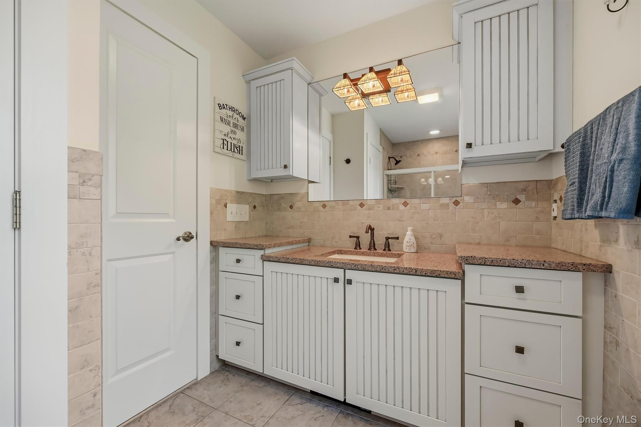 9 Short Road New Windsor, NY 12553 - Photo 30 of 48 Convenient second-level hall bath with plenty of storage overlooking the lake.