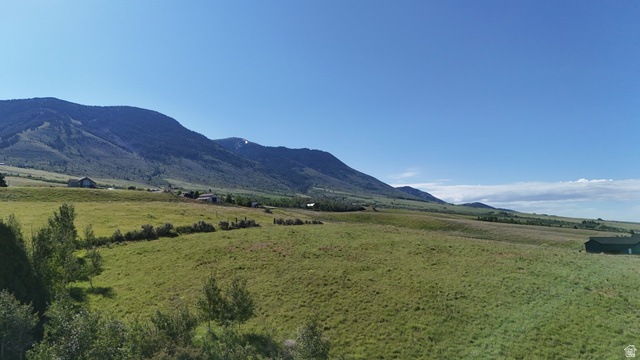 1398 Mogul Lane, Unit 1 Inkom, ID 83245 - Photo 8 of 33 Expansive natural landscape featuring rolling green hills and distant mountains