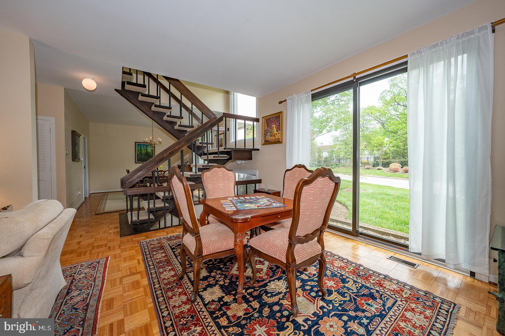 10 Brettagne, Unit 10 Devon, PA 19333 - Photo 16 of 46 a dining room with furniture and a window