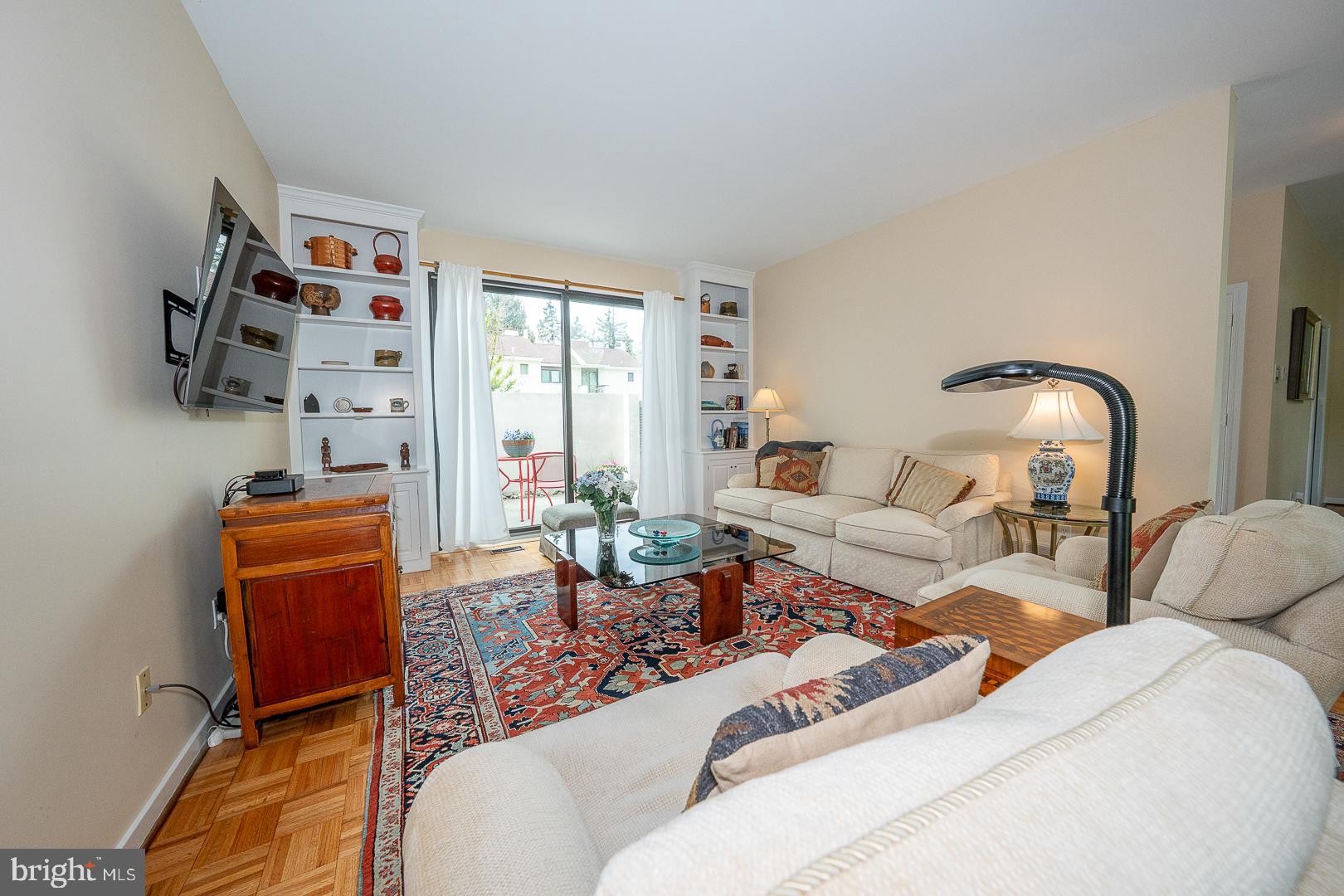 10 Brettagne, Unit 10 Devon, PA 19333 - Photo 17 of 46 a living room with furniture and a window