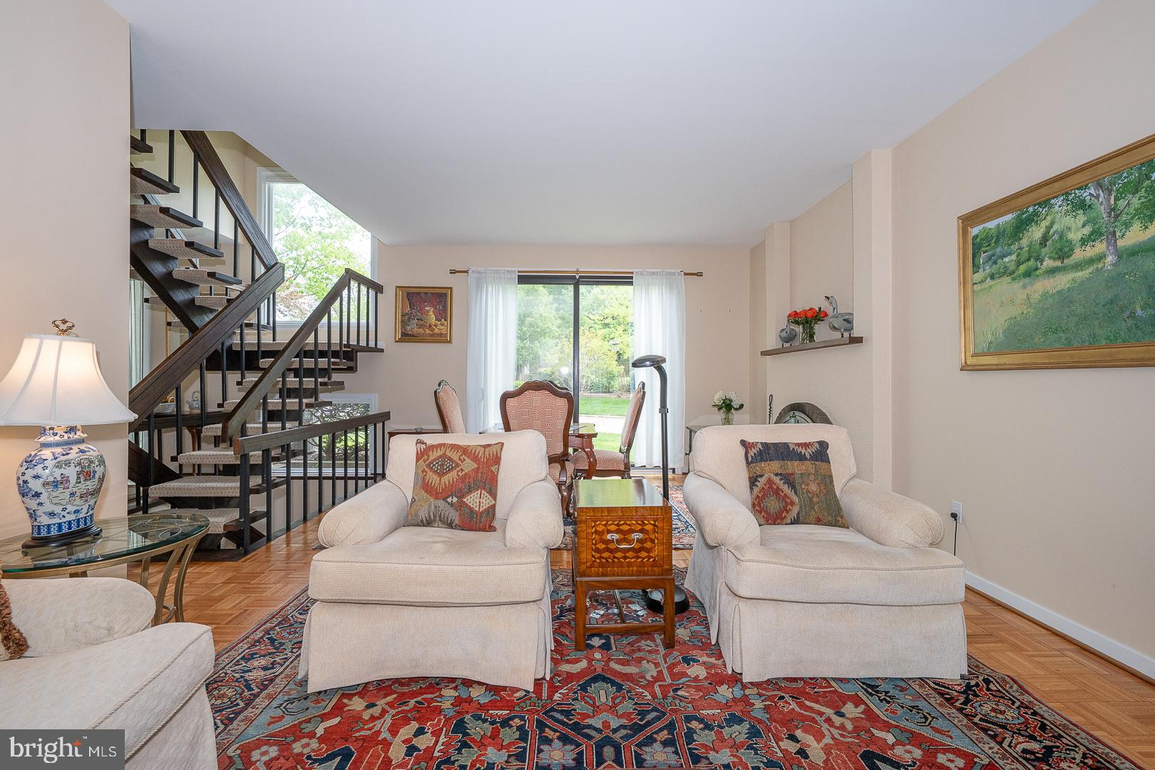 10 Brettagne, Unit 10 Devon, PA 19333 - Photo 20 of 46 a living room with furniture and a large window