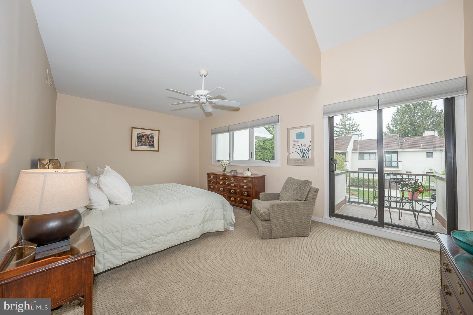 10 Brettagne, Unit 10 Devon, PA 19333 - Photo 21 of 46 a bedroom with furniture and large windows