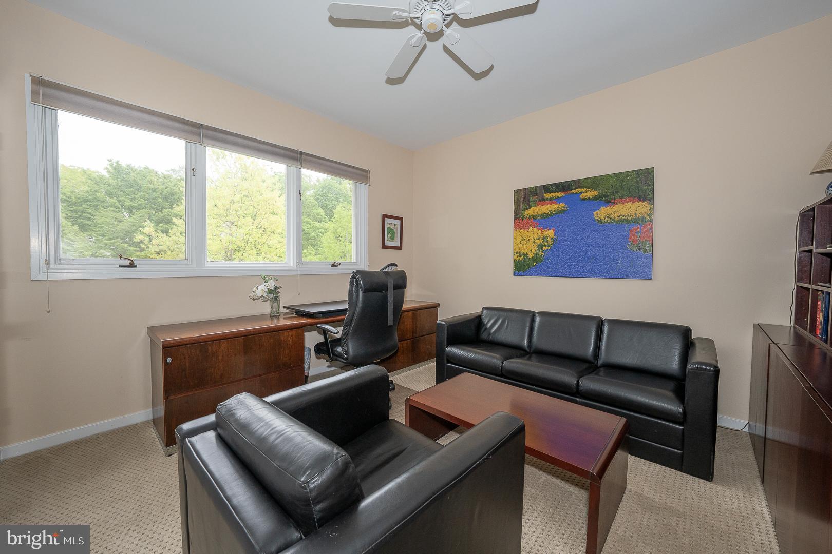 10 Brettagne, Unit 10 Devon, PA 19333 - Photo 29 of 46 a living room with furniture and a window