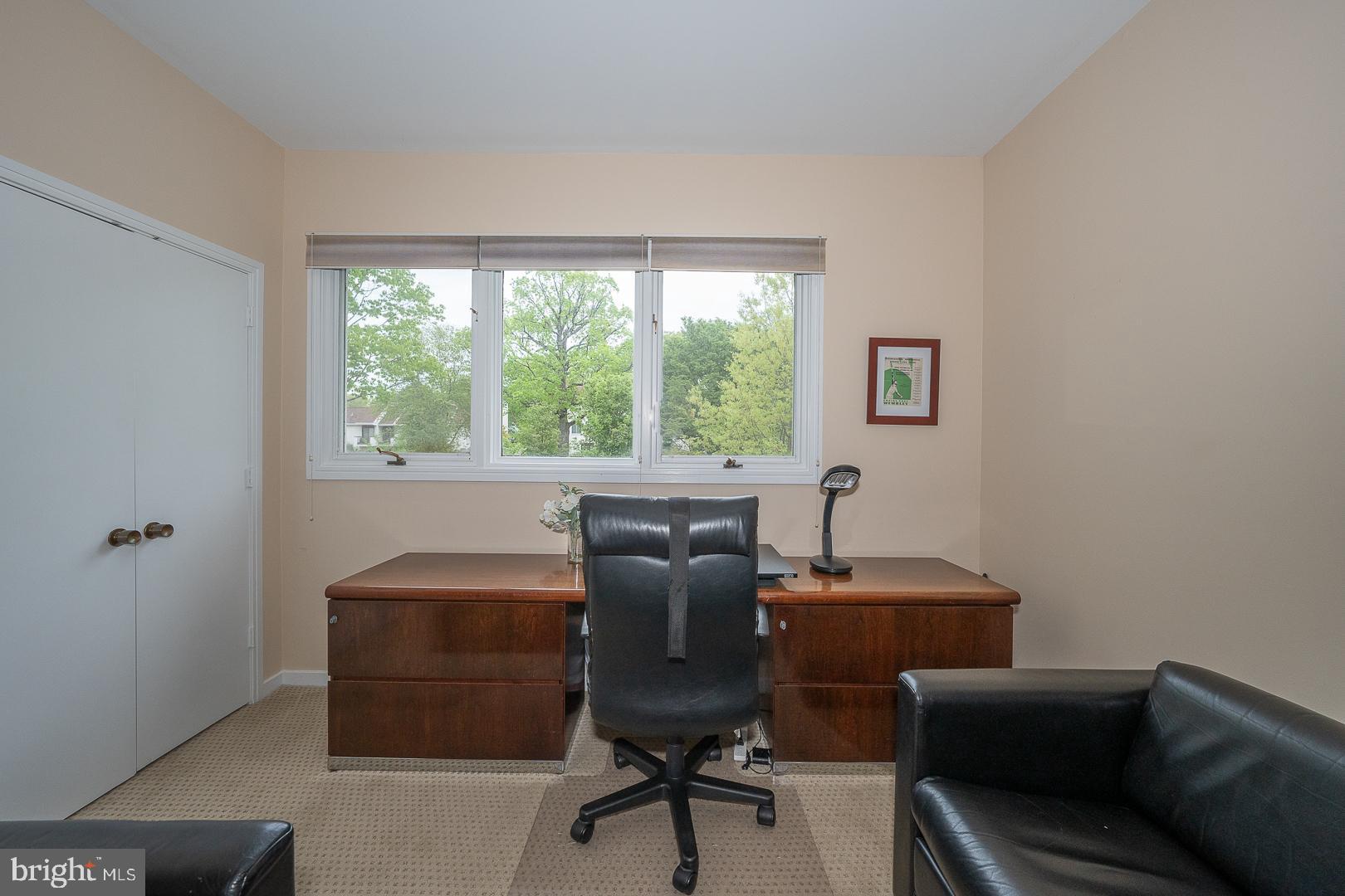 10 Brettagne, Unit 10 Devon, PA 19333 - Photo 30 of 46 a view of a workspace with furniture and a window
