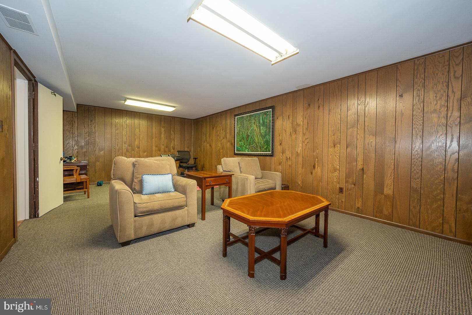 10 Brettagne, Unit 10 Devon, PA 19333 - Photo 32 of 46 a living room with furniture and a window