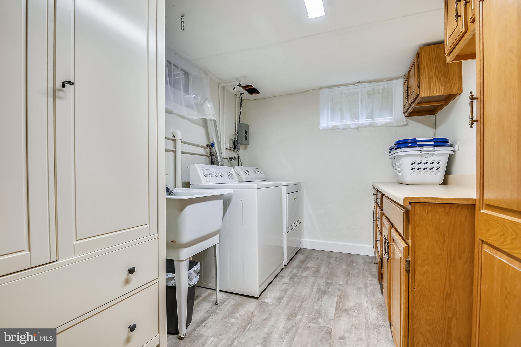 5102 Springlake Way Baltimore, MD 21212 - Photo 26 of 38 Separate laundry area with storage