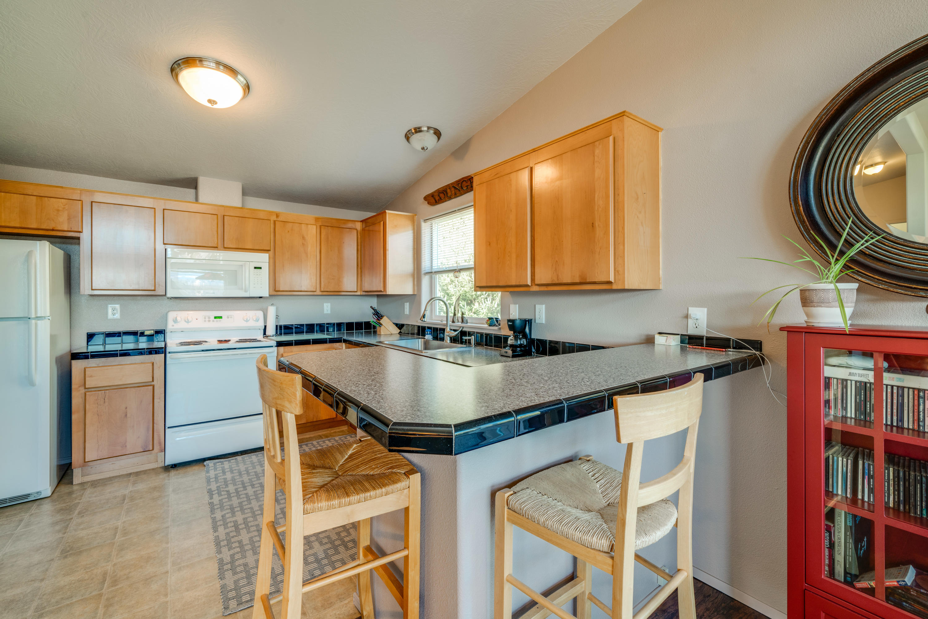 178 South River View Street Wheeler, OR 97147 - Photo 5 of 32 Breakfast bar in kitchen
