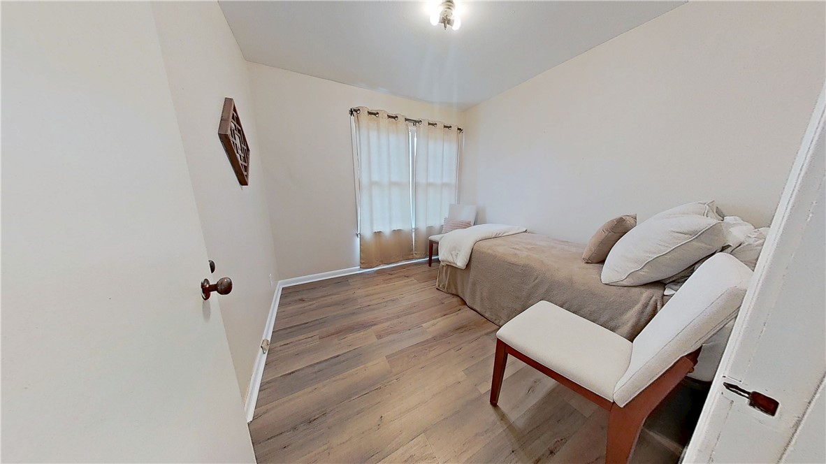 4805 Alice Street Corpus Christi, TX 78411 - Photo 11 of 19 a view of a livingroom with furniture and wooden floor